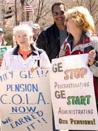 One of three photos on this page; RAGE members at Erie Rally