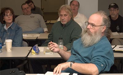 GE Conference Board photo of Denise Hivick, Local 751; Frank Fusco, Local 506; Karl Zimmerman, UE Research Dept.; Ed Baran, Local 751; Rich Plymyer, Local 506; Ken Lowther, Local 707; and Steve Harris, Local 506