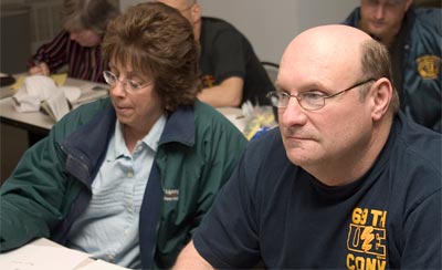 GE Conference Board photo of Marcia Barnhart and John Payne, Local 731