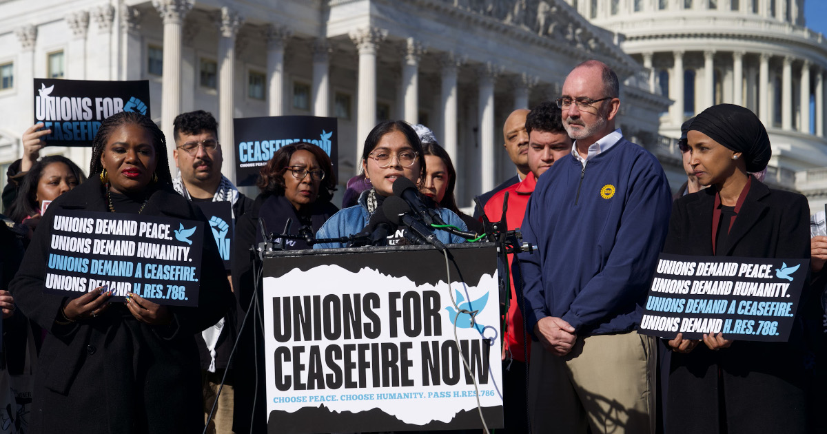 UE member Janvi Madhani speaking at a press conference