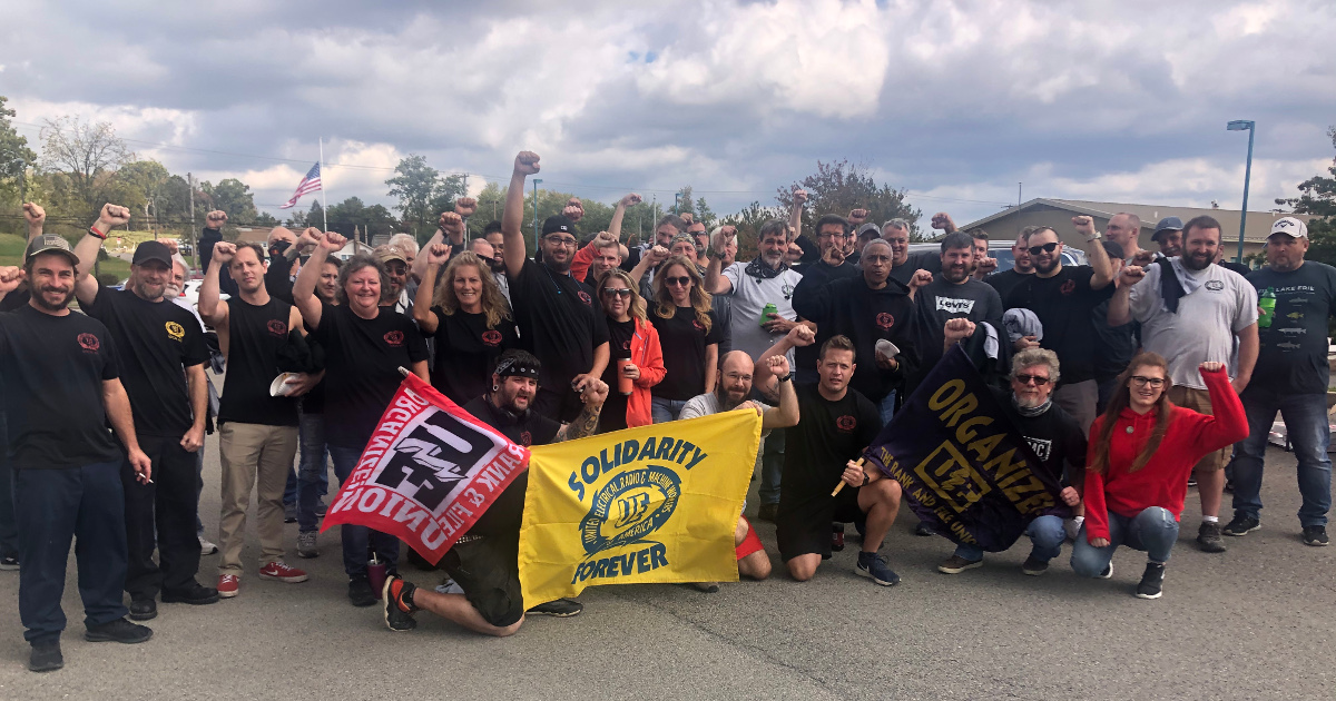 UE members rallying with flags