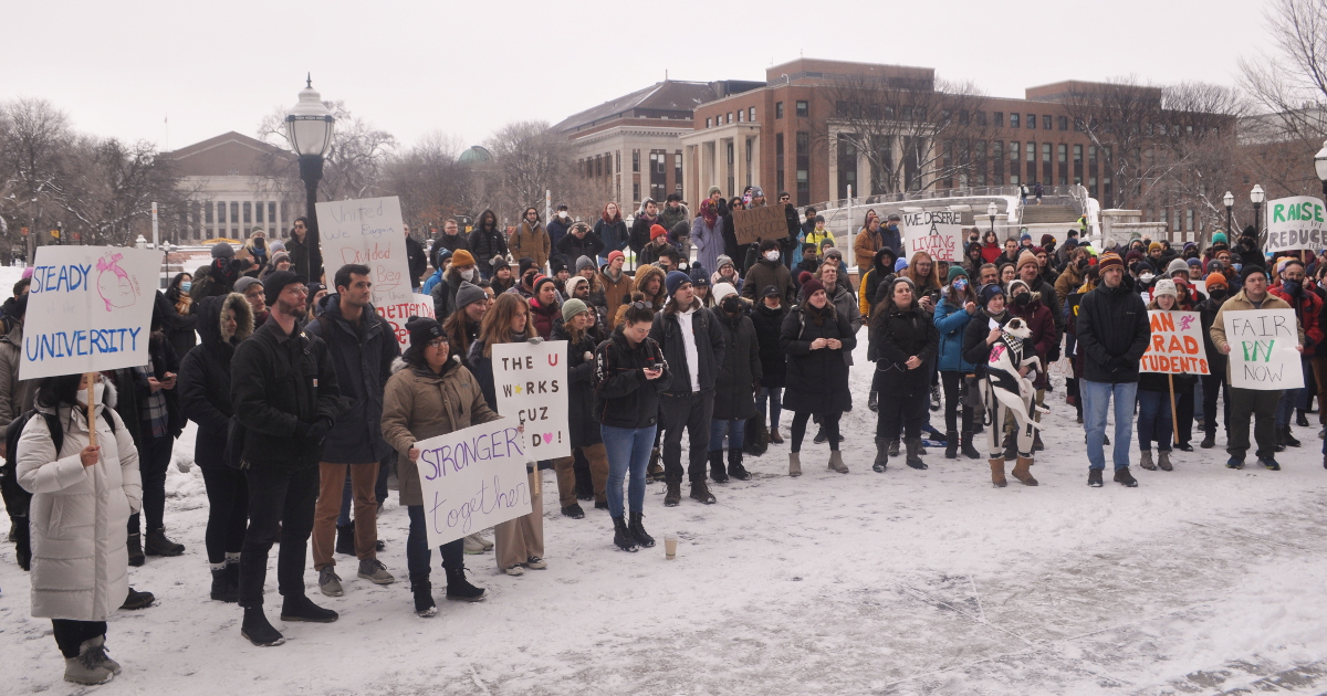 University of Minnesota graduate workers rally to launch their union drive in the snow