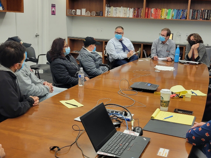 UE members meeting with staff from the New York City comptroller’s office