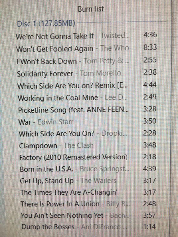 Photo of a "Burn List" for a CD, starting with "We're Not Gonna Take It"