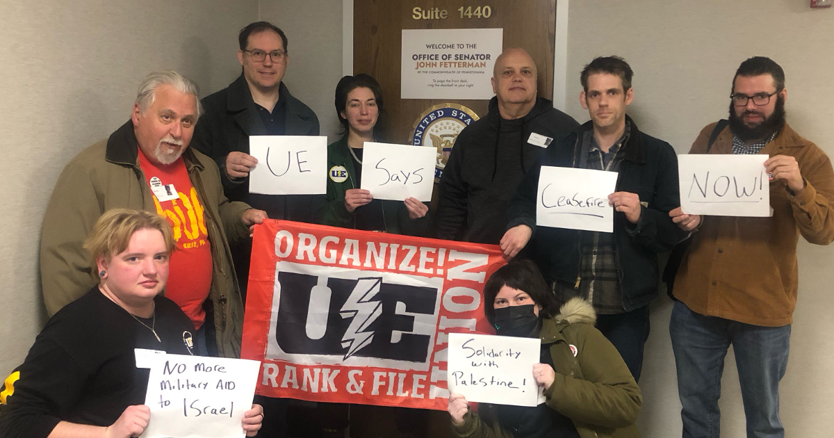 UE members outside of Senator Fetterman's office with signs reading UE Says Ceasefire Now, No More Military Aid to Israel, and Solidarity with Palestine!