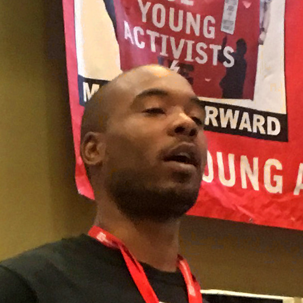Photo of an African-American man speaking