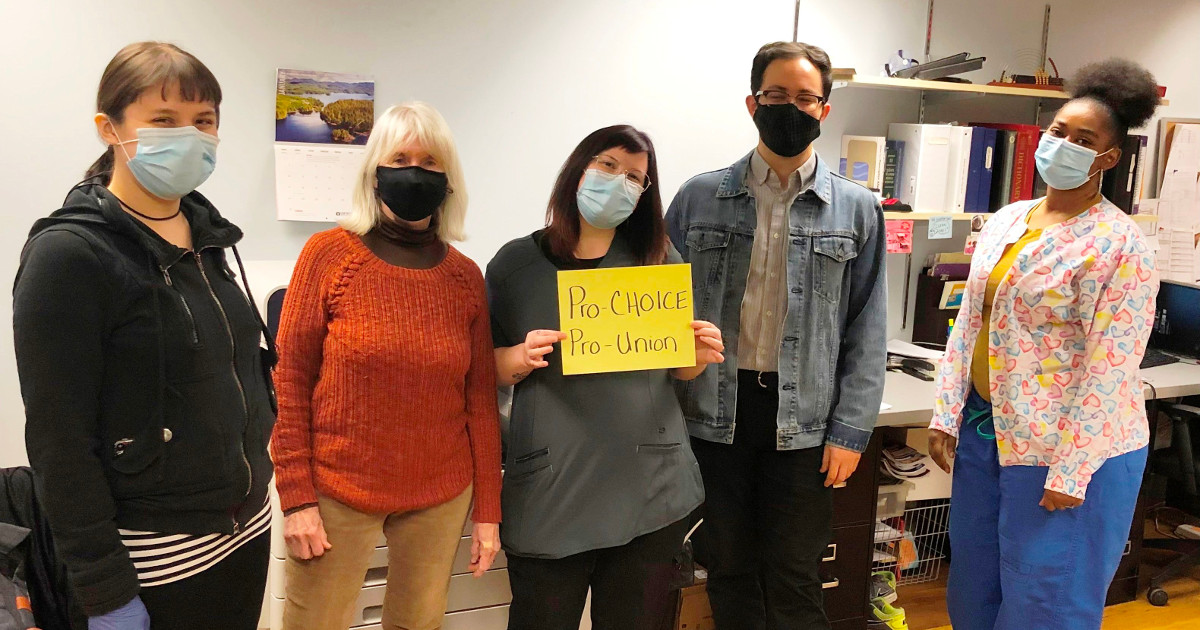 Workers with Pro-Choice, Pro-Union sign