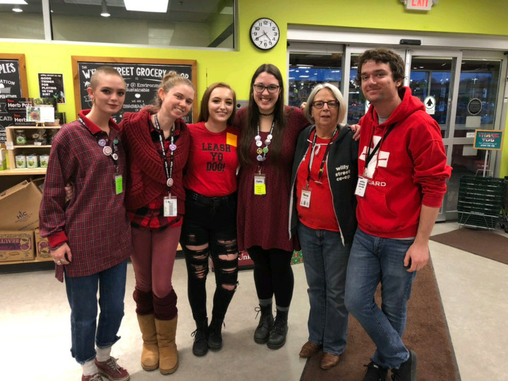 Co-op workers wearing stickers